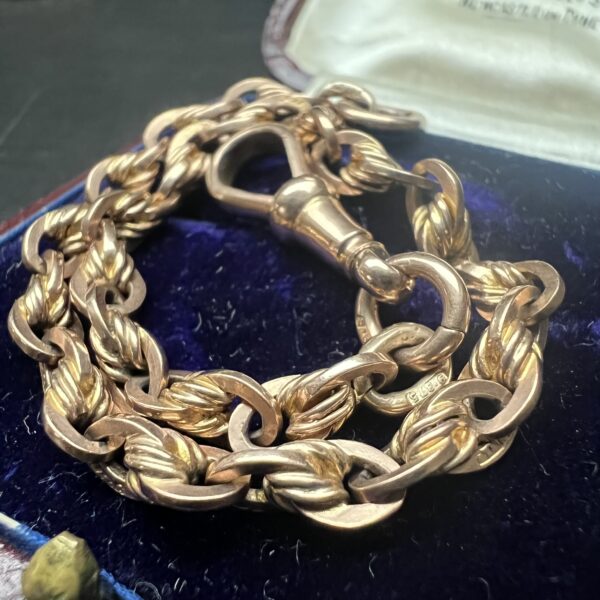Antique gold knot link bracelet with dog clip